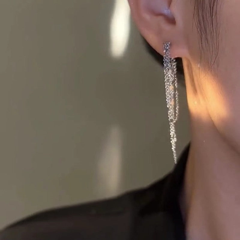 Dreifache Quasten-Ohrringe