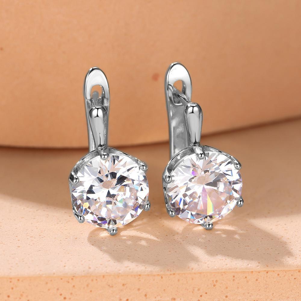 Luxuriöse Goldtropfen-Ohrringe mit großem Zirkonia