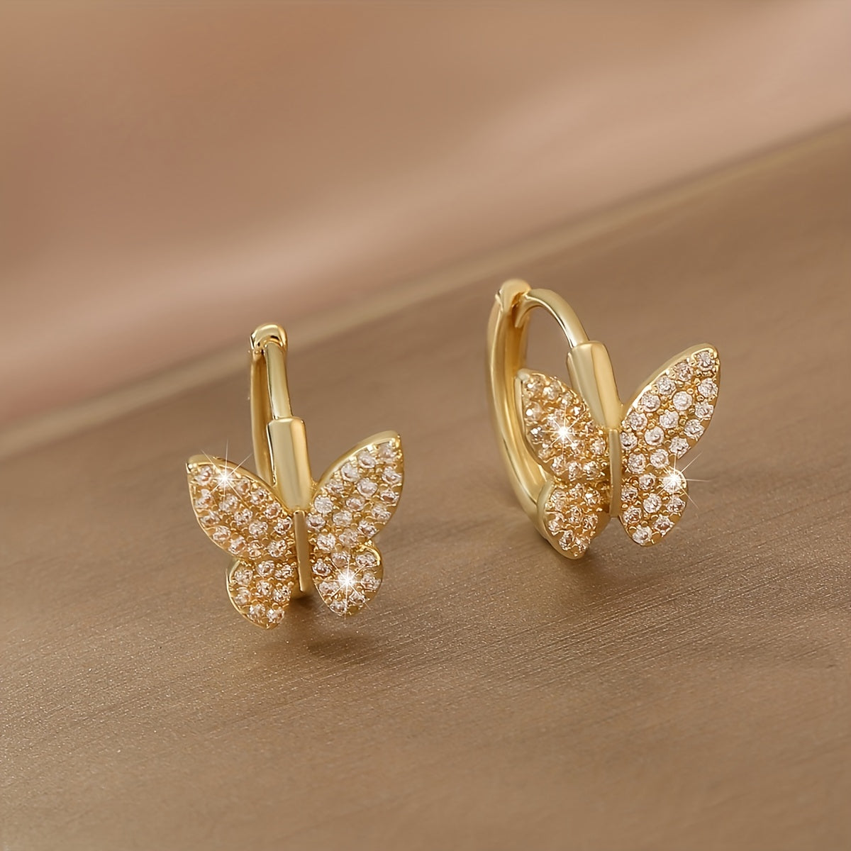 Luxuriöse Schmetterlings-Creolen – Funkelndes Gold