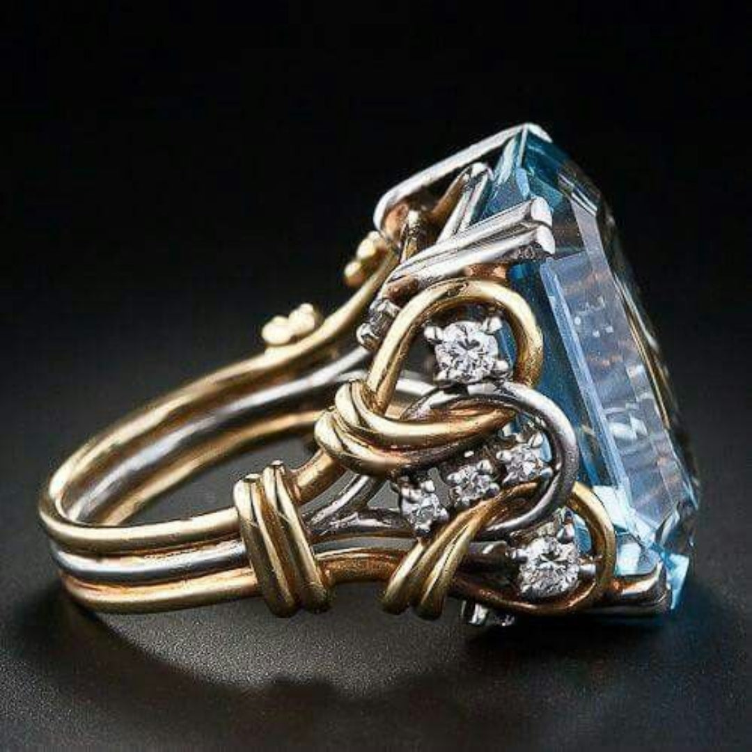 Mehrlagiger Vintage-Ring aus Gold mit blauem Zirkoniastein