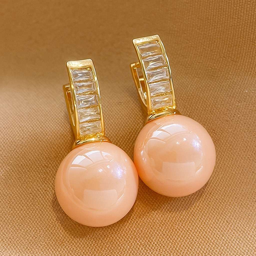 Schicke Hoop-Ohrringe mit rosa Perle