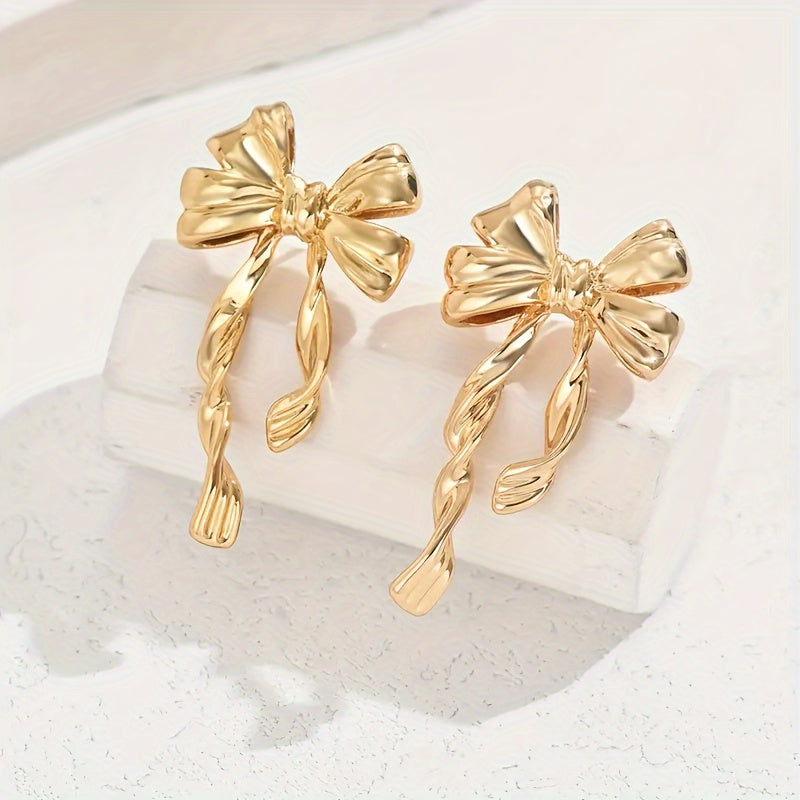 TwinkleTies Golden Bowknot Stud Duo für mühelosen Charme
