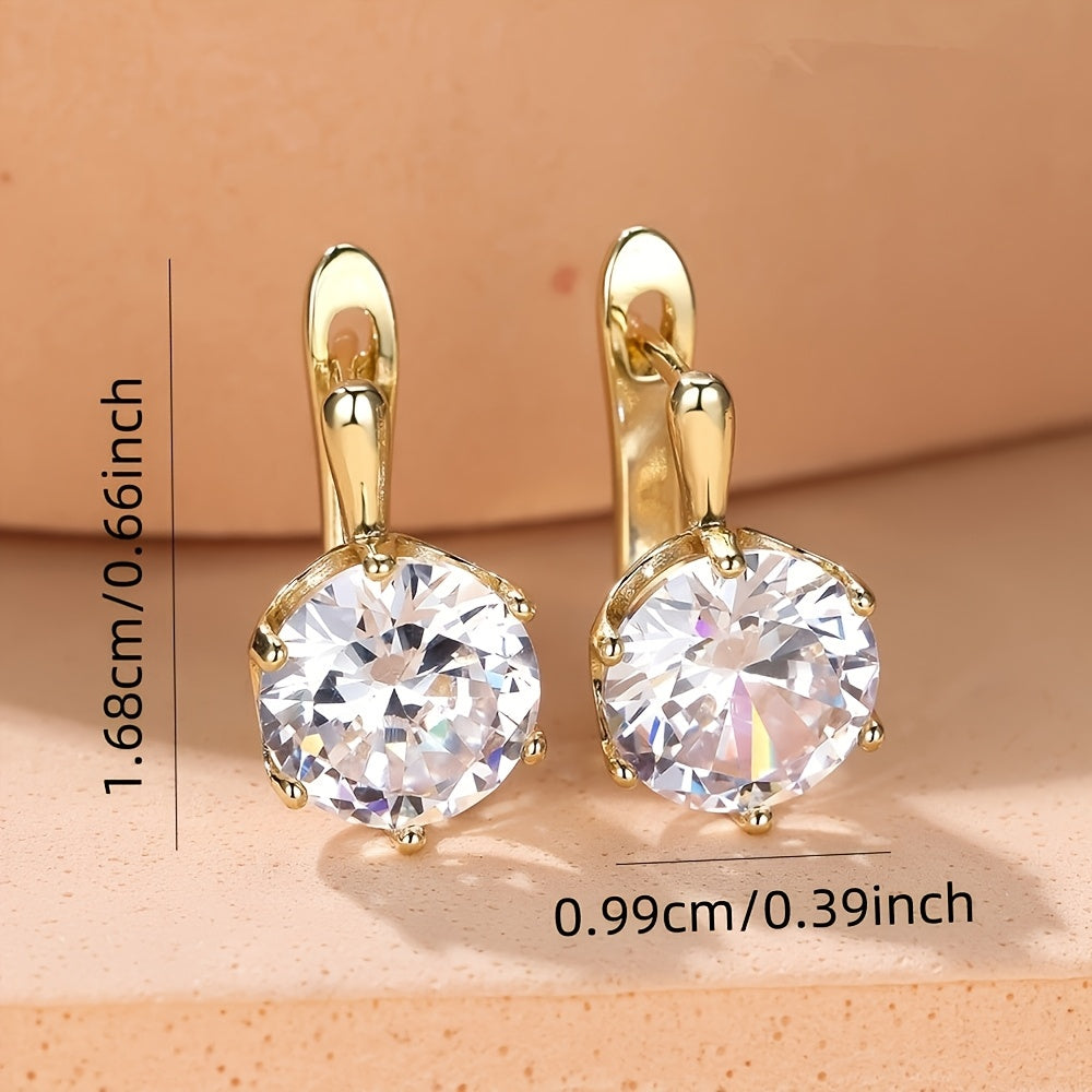 Luxuriöse Goldtropfen-Ohrringe mit großem Zirkonia