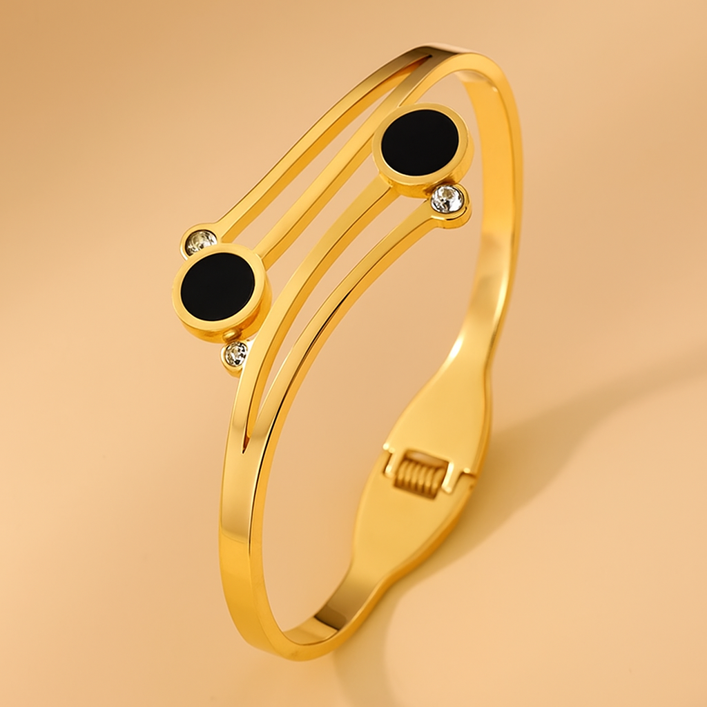 Minimalistisches Goldarmband - schlichte schwarze Akzente