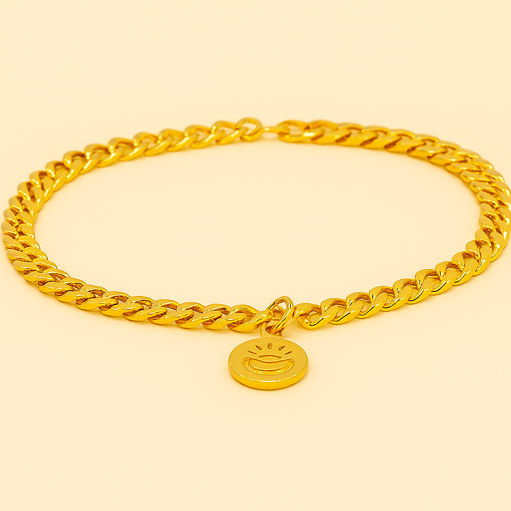 Elegantes gold kubanisches Kettenarmband mit Münzanhänger