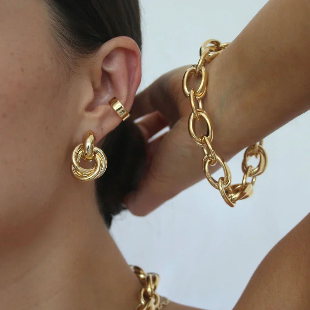 Aussage ineinandergreifende Ohrringe | Gold