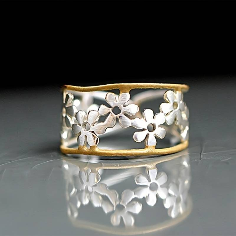 Unregelmäßiger Ring mit hohlem Gänseblümchen-Design